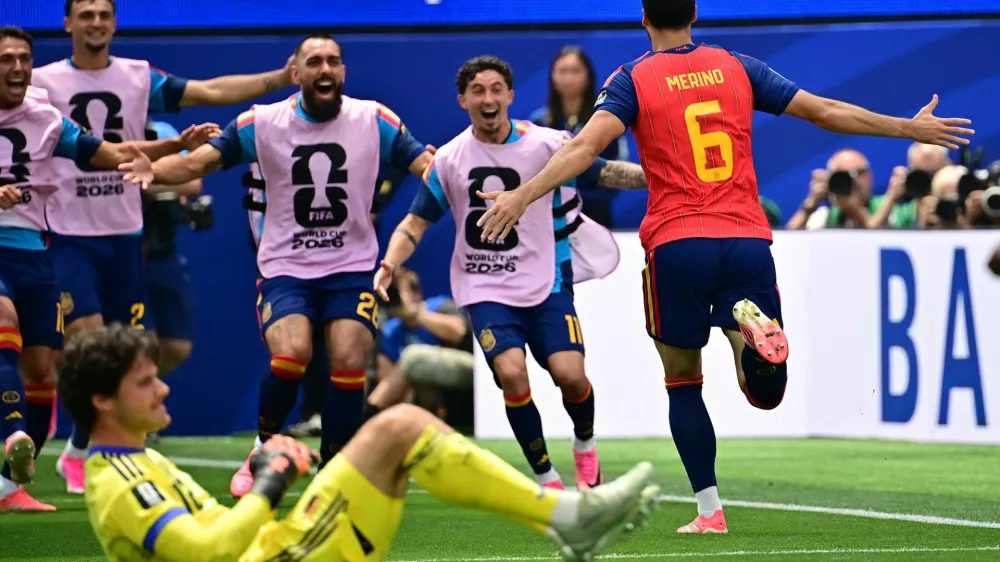 Soccer Football - FIFA World Cup 2026 - Quarter Final - Spain v Belgium - Los Angeles Stadium, Inglewood, California, U.S. - July 10, 2026 Spain's Mikel Merino celebrates scoring their second goal as Belgium's Senne Lammens looks dejected IMAGN IMAGES via Reuters/Gary Vasquez
