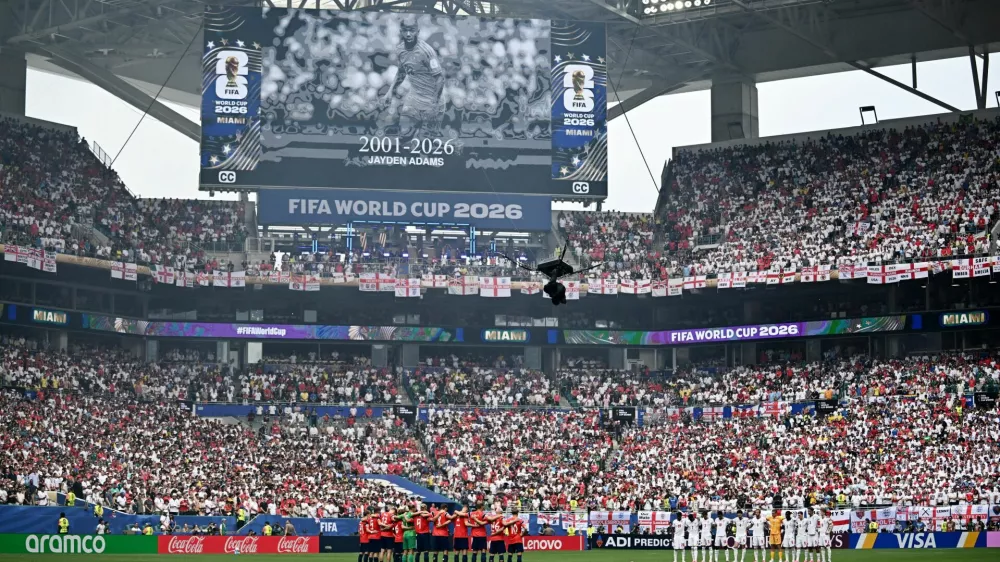 Soccer Football - FIFA World Cup 2026 - Quarter Final - Norway v England - Miami Stadium, Miami Gardens, Florida, U.S. - July 11, 2026 The players stand during a minutes silence in memory of South African's Jayden Adams before the match REUTERS/Dylan Martinez   TPX IMAGES OF THE DAY