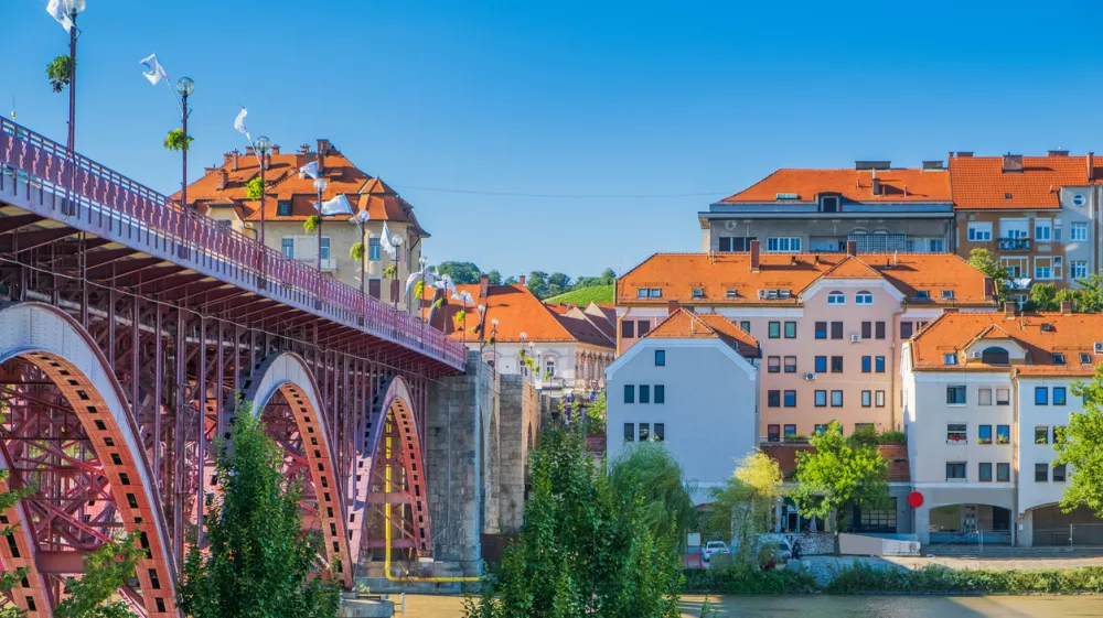 Main bridge over Drava river and cityscape of city of Maribor, Slovenia