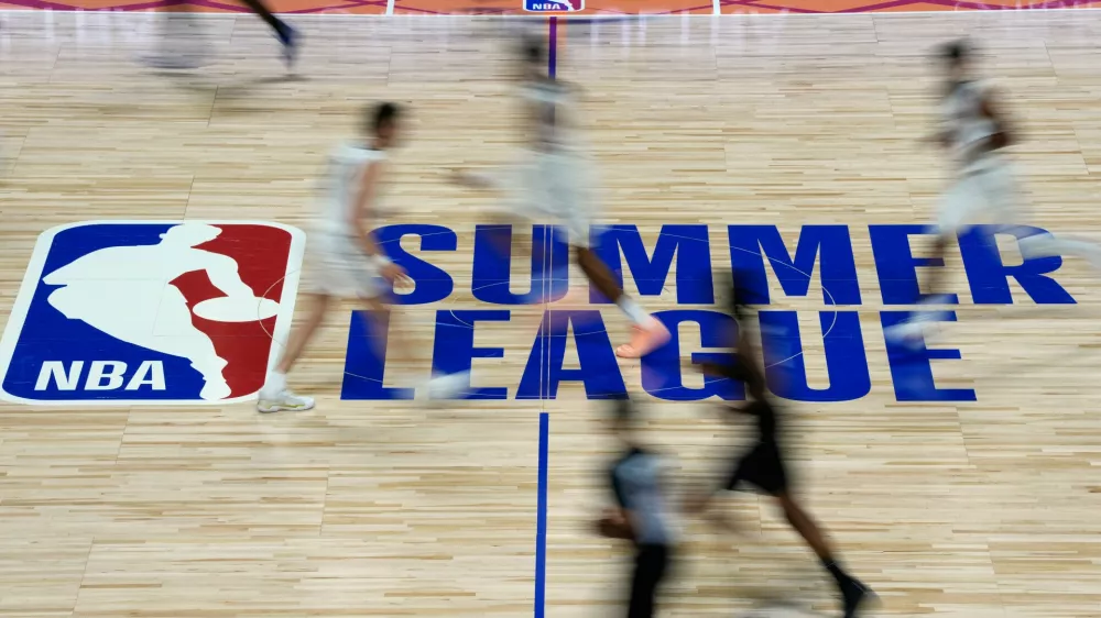 The LA Clippers and Sacramento Kings play during the second half of an NBA Summer League basketball game Thursday, July 9, 2026, in Las Vegas. (AP Photo/John Locher)