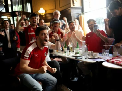 Fans react during a public viewing of the FIFA World Cup 2026 match between Austria and Jordan at Cafe Sperl in Vienna, Austria, June 17, 2026. REUTERS/Lisa Leutner   TPX IMAGES OF THE DAY        SEARCH "WORLD CUP FANS" FOR THIS STORY. SEARCH "WIDER IMAGE" FOR ALL STORIES.