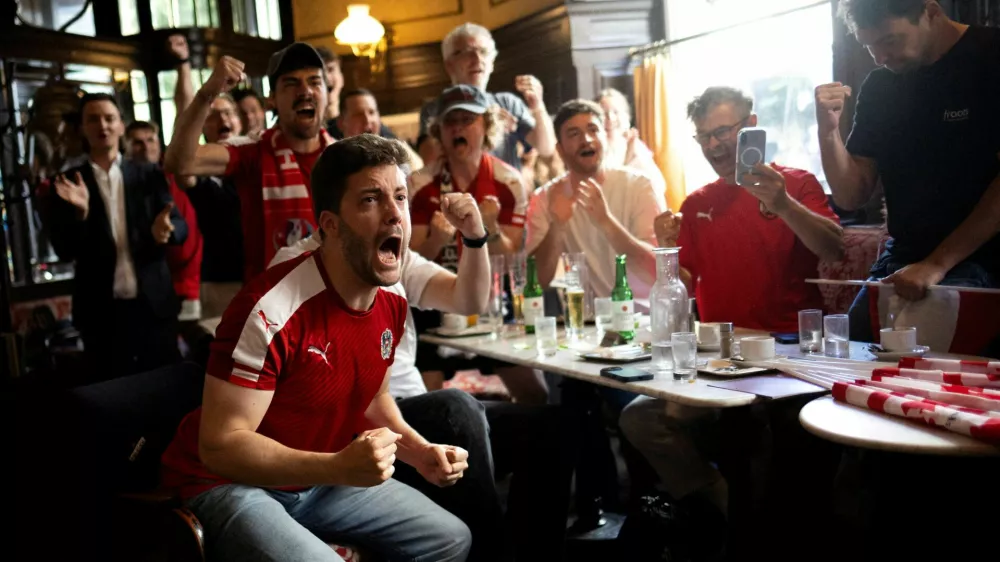 Fans react during a public viewing of the FIFA World Cup 2026 match between Austria and Jordan at Cafe Sperl in Vienna, Austria, June 17, 2026. REUTERS/Lisa Leutner   TPX IMAGES OF THE DAY        SEARCH "WORLD CUP FANS" FOR THIS STORY. SEARCH "WIDER IMAGE" FOR ALL STORIES.