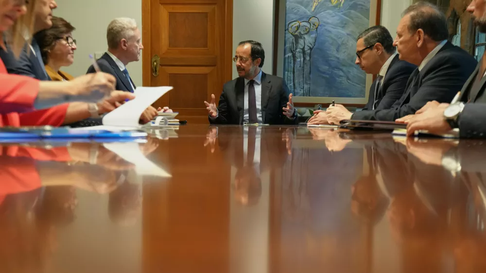 Lebanese Prime Minister Youssef Rajji, rear left, Cyprus President Nikos Christodoulides, center, and Cypriot Foreign Minister Constantinos Kombos, rear right, speak during a meeting at the Presidential Palace in Nicosia, Cyprus, Thursday, July 9, 2026. (AP Photo/Petros Karadjias)