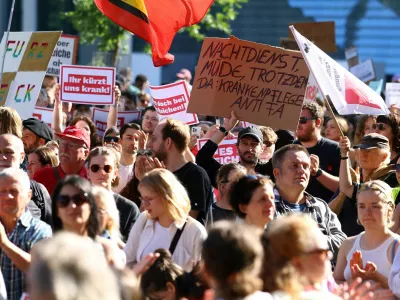 People protest before the German parliament votes on changes to public health insurance in Berlin, Germany, July 10, 2026.   REUTERS/Lisi Niesner