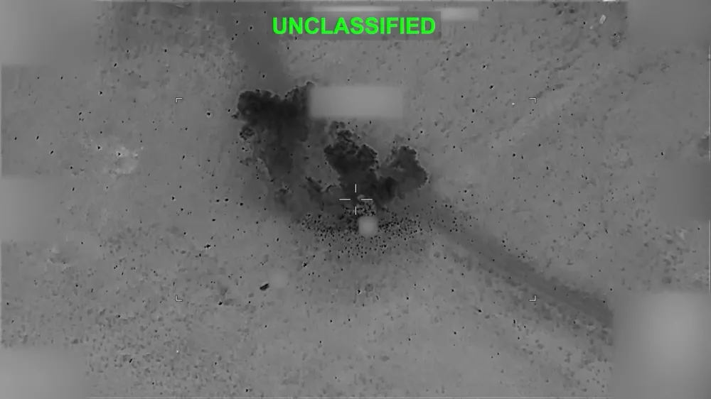 Smoke rises following an attack on a target at an unknown location, following what U.S. Central Command (CENTCOM) said were strikes on Iran, in this screen grab taken from a handout video released on July 12, 2026. U.S. Central Command/Handout via REUTERS  THIS IMAGE HAS BEEN SUPPLIED BY A THIRD PARTY. MANDATORY CREDIT. OVERLAY AND MASKING AT SOURCE. VERIFICATION: - Reuters was not able to independently verify the location and the date when the video was filmed. - No earlier version of the video found posted online before July 12.