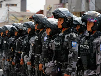 Police officers stand in formation outside El Inca prison after a security operation due to riots, following the disappearance of Jose Adolfo Macias, alias 'Fito', leader of the Los Choneros criminal group, in Quito, Ecuador, January 8, 2024. REUTERS/Karen Toro