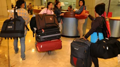 Some on the 30 repatriated Filipino workers arrive at the Manila International Airport on November 4, 2013. Thousands of stranded overseas Filipino workers (OFWs) are in danger of being violently detained, arrested and detained by Saudi authorities as crackdowns are expected to resume in the Kingdom of Saudi Arabia November 3, 2013.,Image: 175867919, License: Rights-managed, Restrictions:, Model Release: no 