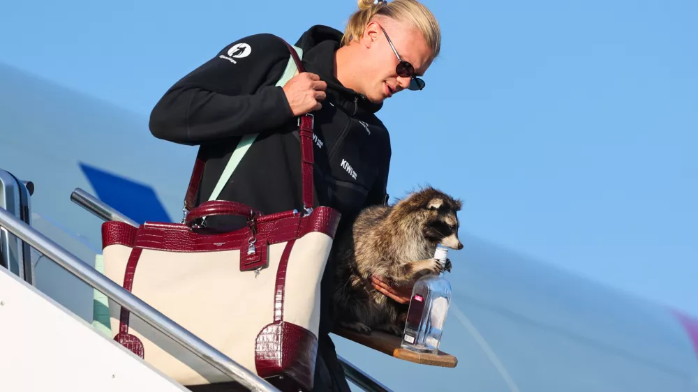 Norway's Erling Haaland gets off the plane after his national soccer team landed at Oslo Airport, in Gardermoen, Norway, Monday, July 13, 2026. (Jan Langhaug/NTB Scanpix via AP)