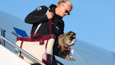 Norway's Erling Haaland gets off the plane after his national soccer team landed at Oslo Airport, in Gardermoen, Norway, Monday, July 13, 2026. (Jan Langhaug/NTB Scanpix via AP)