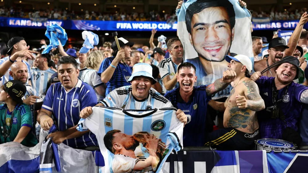 Soccer Football - FIFA World Cup 2026 - Quarter Final - Argentina v Switzerland - Kansas City Stadium, Kansas City, Missouri, U.S. - July 11, 2026 Argentina fans celebrate after the match as Argentina qualify for the semi final of the World Cup REUTERS/Amanda Perobelli