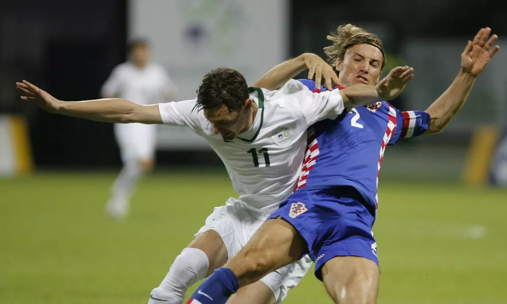 Milivoje Novakovič in Dario &Scaron;imič,- nogomet - Slovenija: Hrva&scaron;ka, prijatelska tekma- Slovenska nogometna reprezentanca je na prijateljski tekmi v Mariboru izgubila proti Hrva&scaron;ki z 2:3 (1:1).//FOTO: Jaka AdamičOPOMBA: ZA OBJAVO V ČASOPISU DNEVNIK