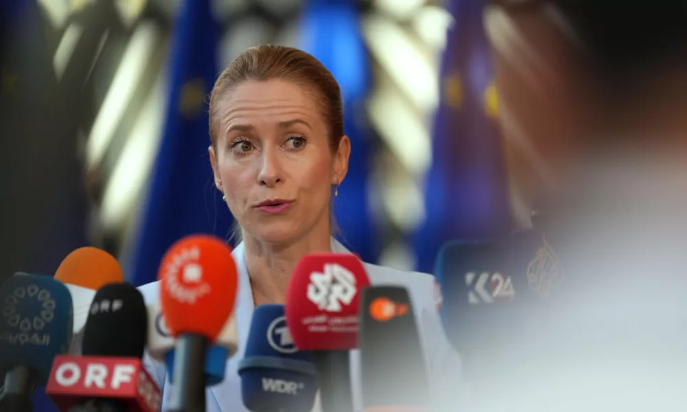 European Union foreign policy chief Kaja Kallas speaks with the media as she arrives for a meeting of EU foreign ministers in Brussels, Monday, July 13, 2026. (AP Photo/Marius Burgelman)