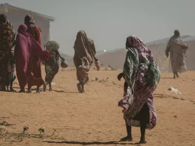 FILE PHOTO: Sudanese refugee women walk at the Tulum refugee camp, amid ongoing conflict in Sudan between the paramilitary Rapid Support Forces (RSF) and the Sudanese army, in Wadi Fira province, eastern Chad, November 30, 2025. REUTERS/Amr Abdallah Dalsh//File Photo