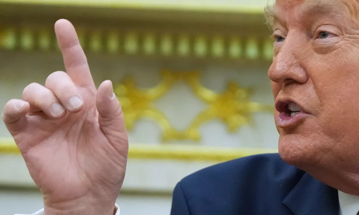 Trump kolumnistki, ki ga je obtožila spolnega napada, plačal večmilijonsko odškodnino