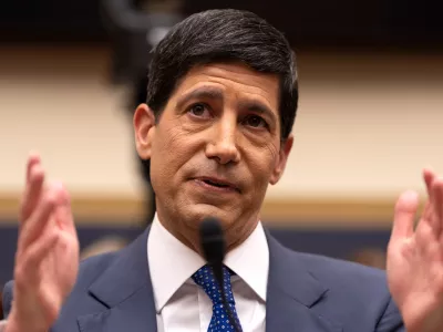 Federal Reserve Chairman Kevin Warsh appears before the House Financial Services Committee on Capitol Hill, Tuesday, July 14, 2026, in Washington. (AP Photo/Mark Schiefelbein)