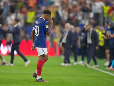 France's Kylian Mbappe walks of the field after his side's lost in a World Cup semifinal soccer match against Spain in Arlington, Texas, near Dallas, Tuesday, July 14, 2026. (AP Photo/Julio Cortez)