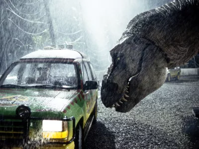 A tyrannosaurus rex terrorizes people trapped in a car in a scene from the 1993 American film Jurassic Park directed by Steven Spielberg. The sci-fi adventure stars Sam Neill, Laura Dern, and Jeff Goldblum. The film is an adaptation of Michael Crichton's novel of the same name. (Photo by Murray Close/Sygma/Sygma via Getty Images)