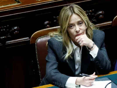 FILE PHOTO: Italy's Prime Minister Giorgia Meloni listens to debate, after she reported on her government's actions and is expected to speak on the latest developments in Iran, at the lower house of Parliament in Rome, Italy, April 9, 2026. REUTERS/Remo Casilli/File Photo