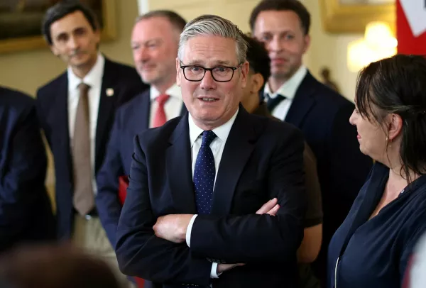 Britain's Prime Minister Keir Starmer speaks with people whose lives are said to have been improved by the Labour Government, during a meeting inside 10 Downing Street in central London, Britain, on July 15, 2026. HENRY NICHOLLS/Pool via REUTERS