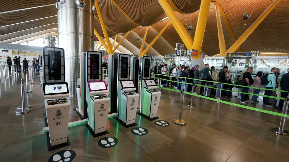FILE PHOTO: Automated European Union's Entry/Exit System (EES) kiosks, at Adolfo Suarez Madrid-Barajas Airport in Madrid, Spain, October 9, 2025. REUTERS/Juan Medina/File Photo