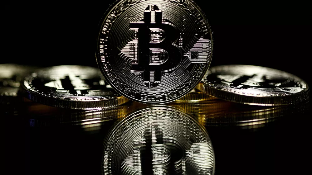 FILE PHOTO: Bitcoins are seen in this illustration picture taken September 27, 2017. REUTERS/Dado Ruvic/Illustration/File Photo
