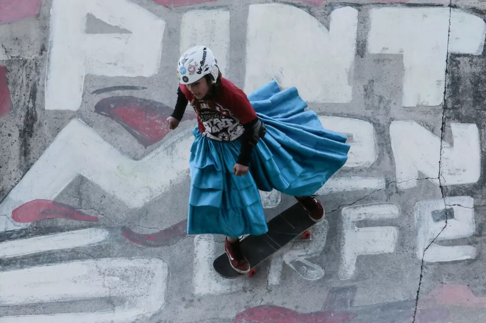 LA PAZ, BOLIVIA - JULY 16: Children wearing the traditional dress of the La Paz cholita skate during the cholita skaters competition in La Paz, Bolivia, on July 16, 2026 Jorge Mateo Romay Salinas / Anadolu,Image: 1116944203, License: Rights-managed, Restrictions:, Model Release: no 