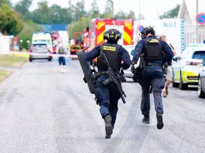 Police respond near the scene of a shooting in N&oslash;rresundby, in the North Jutland region in northern Denmark, Friday, July 17, 2026. (Henning Bagger/Ritzau Scanpix via AP)