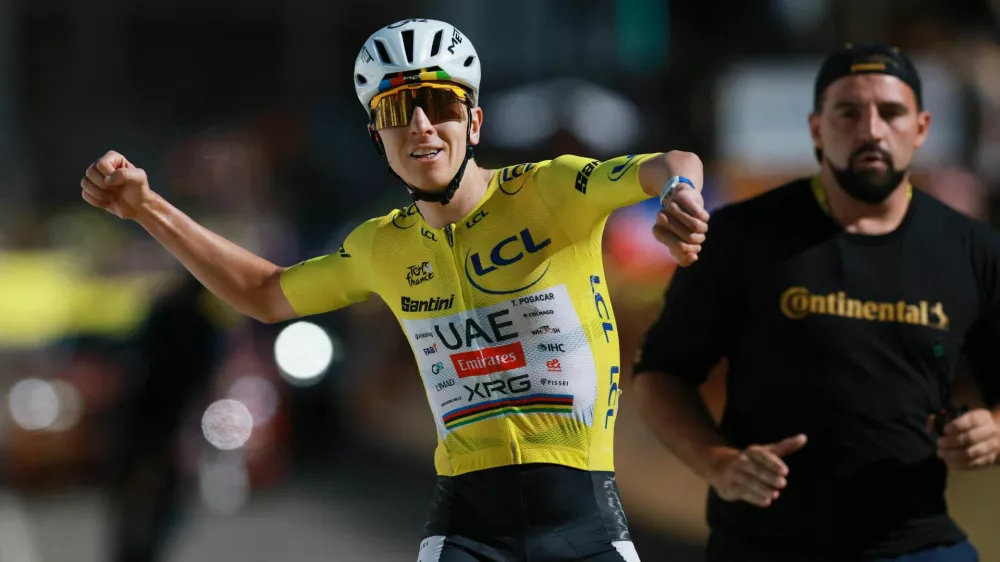 Cycling - Tour de France - Stage 19 - Gap to Alpe d'Huez - Alpe d'Huez, France - July 24, 2026 UAE Team Emirates XRG's Tadej Pogacar celebrates winning stage 19 REUTERS/Stephanie Lecocq