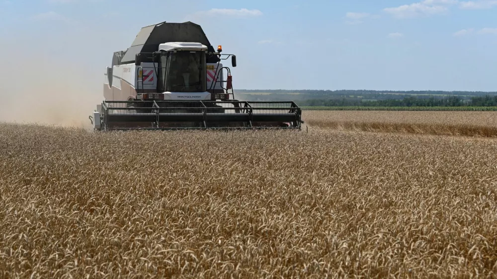 A combine harvests wheat in a field in the Rostov Region, Russia July 14, 2026. REUTERS/Sergey Pivovarov