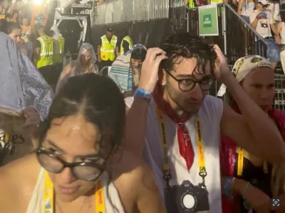 People evacuate from Bad Bunny's concert due to a hailstorm, in Milan, Italy, July 18, 2026, in this screen grab obtained from a social media video. @_enrih_ via Instagram/via REUTERS THIS IMAGE HAS BEEN SUPPLIED BY A THIRD PARTY. MANDATORY CREDIT. NO RESALES. NO ARCHIVES. VERIFICATION LINES: - Location confirmed from media reports and metadata - Coordinates: 45.49093249648833, 9.112358707099997 - Date confirmed from media, weather reports and metadata / Foto: @_enrih_ Via Instagram