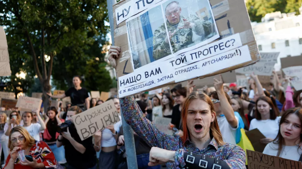 People protest against Ukrainian President Volodymyr Zelenskiy's decision to replace Mykhailo Fedorov as defence minister, amid Russia's attack on Ukraine, in Kyiv, Ukraine, July 17, 2026. REUTERS/Thomas Peter