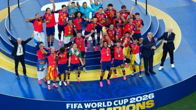 Spain players and coaches celebrate after the World Cup final soccer match between Spain and Argentina in East Rutherford, N.J., near New York, Sunday, July 19, 2026. (AP Photo/Yuki Iwamura)