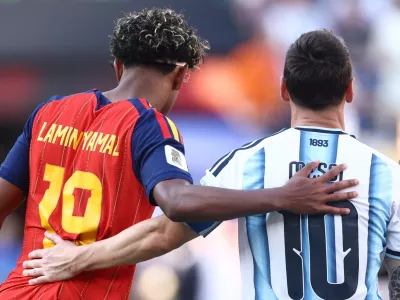 Soccer Football - FIFA World Cup 2026 - Final - Spain v Argentina - New York/New Jersey Stadium, East Rutherford, New Jersey, U.S. - July 19, 2026 Spain's Lamine Yamal with Argentina's Lionel Messi after the match REUTERS/Lee Smith