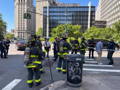 The New York City Fire Department and law enforcement respond to an incendiary device outside the New York federal building in lower Manhattan, Monday, July 20, 2026, in New York. (AP Photo/Larry Neumeister)