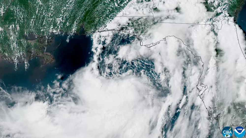A satellite view of Tropical Storm Bertha forming over the eastern Gulf of Mexico near Florida, U.S., July 20, 2026. CSU/CIRA & NOAA/Handout via REUTERS  THIS IMAGE HAS BEEN SUPPLIED BY A THIRD PARTY. OVERLAY AND WATERMARK FROM SOURCE. MANDATORY CREDIT.