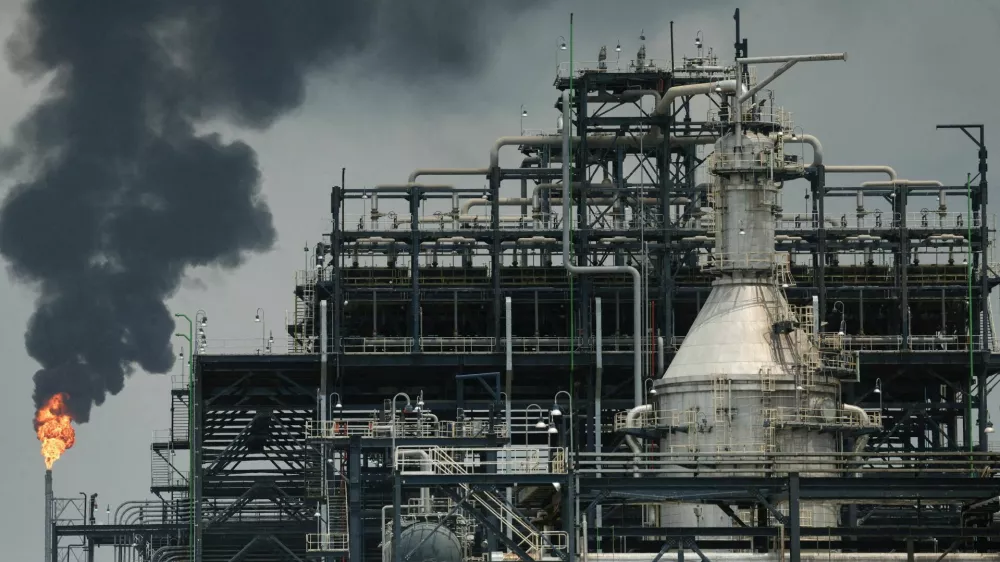 FILE PHOTO: A flame rises from a gas flare at the Dangote oil refinery and fertilizer plant site in the Ibeju Lekki district of Lagos, Nigeria, March 2, 2026. REUTERS/Sodiq Adelakun/File Photo