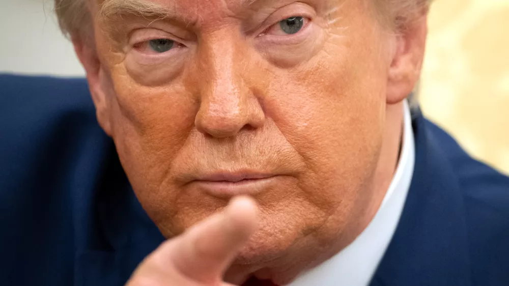 President Donald Trump gestures while meeting with Lebanese President Joseph Aoun in the Oval Office at the White House, Tuesday, July 21, 2026, in Washington. (AP Photo/Mark Schiefelbein)