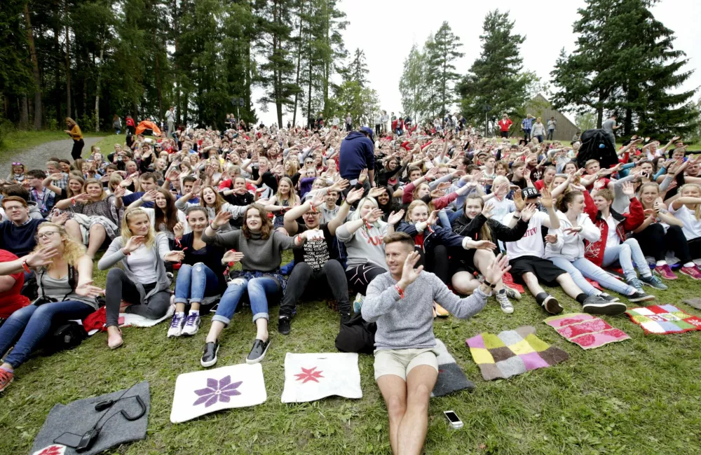 Former leader of Labour Youth Organisation (AUF) and attack survivor Eskil Pedersen (front) and other youths attend the opening of the summer camp at Utoya island, Norway, August 7, 2015. Four years after Anders Behring Breivik went on a shooting rampage that left 69 dead, the AUF is again inviting youths to join their summer camp on Utoya island. REUTERS/Vidar Ruud/NTB ScanpixATTENTION EDITORS - THIS IMAGE WAS PROVIDED BY A THIRD PARTY. THIS PICTURE IS DISTRIBUTED EXACTLY AS RECEIVED BY REUTERS, AS A SERVICE TO CLIENTS. FOR EDITORIAL USE ONLY. NOT FOR SALE FOR MARKETING OR ADVERTISING CAMPAIGNS. NORWAY OUT. NO COMMERCIAL OR EDITORIAL SALES IN NORWAY. NO COMMERCIAL SALES.