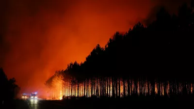 A wildfire burns in a forest area in the Gironde department amid worsening drought conditions following a heatwave and water shortages across much of France, July 22, 2026. REUTERS/Stephane Mahe