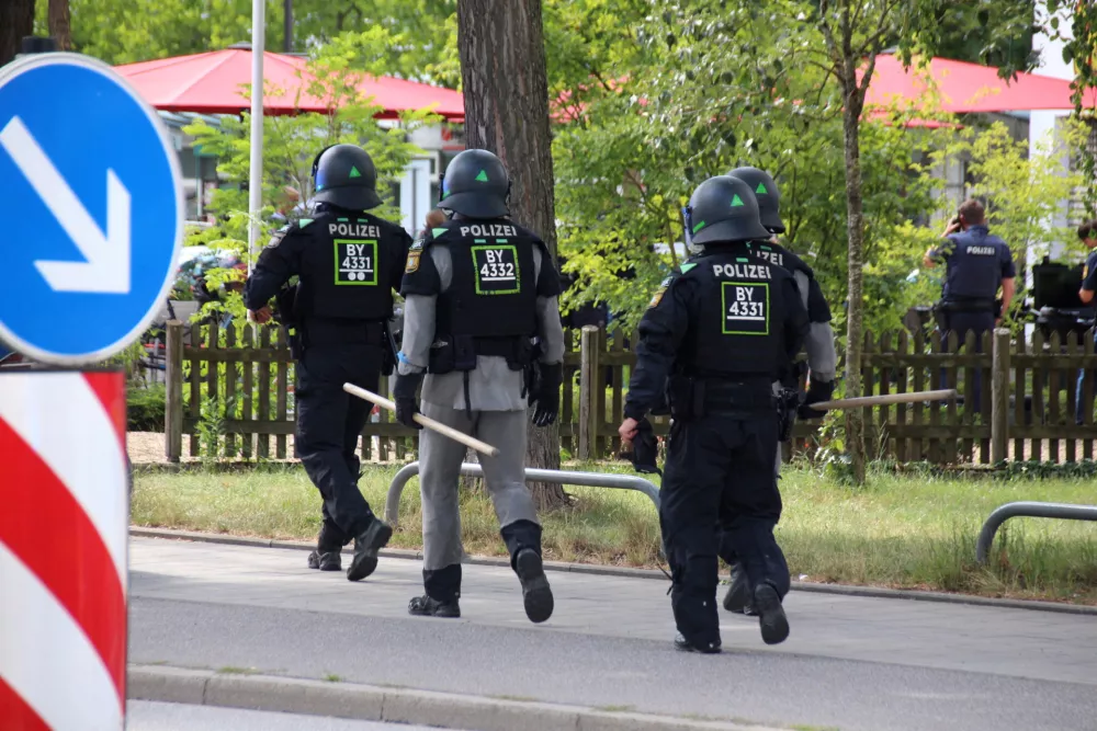 Police walks during a hostage-taking situation in a bank in Regensburg, Germany, July 23, 2026.  REUTERS/Mario Moller