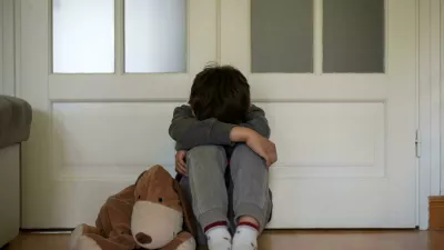 2PPHXA6 view of a child victim of child abuse in his room