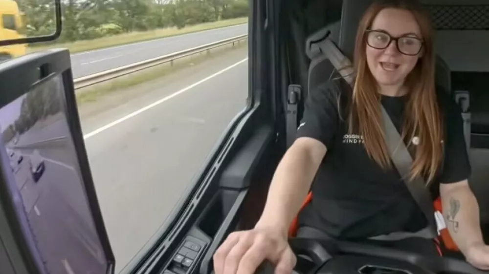 Story from Jam Press (Female HGV Driver)Pictured: Video grab: Hannah Robinson.'I dreamed of being a bin man as a little girl &ndash; now I drive 44 tonne trucks for a living'A woman who dreamed of being a "bin man" when she was a child now drives 44 tonne trucks for a living.Hannah Robinson works as a Class 1 HGV driver, travelling across the UK and even overseas as part of a growing haulage business she helped build from the ground up.The 32-year-old prides herself on being one of the North East's most recognisable female truck drivers and says she has never let stereotypes stand in her way."When I was little, I used to watch the bin men driving up the street and say to my mam 'I'm going to be a bin man'," Hannah, from Hartlepool, County Durham, told creatorzine.com."My uncles and cousins are truckers and my grandad was a bus driver, so I suppose it's in my blood."Being a female driver, you do feel you have a point to prove in order to show you're just as capable as a man."During tight and difficult manoeuvres, I've been asked if I can manage and had men offer to do it for me."I often find myself saying 'it's ok, I can do it'."On one of our jobs, I drive a forklift and help out with manual labour, which involves lifting 250-litre drums."I once had someone run over and say, 'leave them for us, they're too heavy for you'."I was quick to prove them wrong."Because of my height, people assume I'm not strong enough to reach or lift things and try to do it for me."I'm grateful for the help, of course, but I'm stronger than I look and not afraid to ask for help if I do need it."I'm sure they come from a good place but I'd rather they just let me do it and ask I'll ask for help myself if I need it."Fortunately, she says the vast majority of drivers and colleagues have been welcoming.She said: "I've had the usual 'what's a girl like you doing in a job like this?' kind of comments, but nothing ever malicious."On the refineries, I'm treated the same as the men and that's how it should be."We have a laugh and I give as good as I get, but having thick skin and a good sense of humour goes a long way."People are usually more curious than anything; I often get asked if I'm ex-army."But she says social media is a different storyHannah, who used to be a children's face painter, shares snippets of her life driving trucks on her TikTok HGV Han.Hannah now earns around Ł5,000 a month at a job she loves and says every day is different.She said: "I'm never in the same place."I could be up at 5am, start work at 6, do my defect checks on the truck and trailer, then drive to my delivery point which could be England, Scotland or Wales."I've delivered everything from recycling to machinery, motorbikes and even tins of spam."When I'm working on the refineries, an average day includes clocking in, getting into overalls and working on site, covering all logistics from escorting loads to shunting trailers."I help the lads out with manual work too when I can."Hannah says keeping fit on the road is difficult and she wants all truck stops to have facilities such as gyms.She said: "After working a 12-hour day, all you want to do it eat and sleep.""I ran a marathon last year so I had to train while I was away in the truck."I'd park up on the industrial estate overnight, get my trainers and headphones on and run for miles."I enjoy yoga too, so I would do that in the cab."There are too many drivers facing health problems because of the lack of exercise and food options."Hannah says she's been branded as "desperate" by male drivers online.Hannah said: "When I announced my TikTok, amongst the support I had a barrage of comments from disgruntled male drivers, calling me an attention seeker and desperate."It really doesn't bother me."I expected it and it's sad that we live in a world where it's acceptable to call people all sorts of names online."I can see why it would affect people's mental health."They are literally strangers and don't know me."If they met me in person, their opinions would change because I get on with everyone."I got accused of doing OnlyFans."That was hilarious to me as it couldn't be further from the truth."Hats off to the girls that do it, each to their own and they're making a lot more money than the people slating them online but it could never be me and that's ok too."I told them I'd screenshot their comment and use it in a future video and they soon changed their tune."I just wonder if they have daughters and if they'd appreciate a man saying that to them."We had a laugh replying to them all but they helped me gain traction on my page, so a big thanks to them."Hannah first began training for her Class 2 licence in 2016 at the age of 21 but suffered a setback when she failed her test.At around the same time, her friend Callum, an experienced Class 1 driver, had decided to launch his own agency.The pair teamed up and what would eventually become C.W Haulage Services was born.Hannah said: "He took me under his wing and got me my first job, driving roll-on-roll-off skips for six months and I loved it."That's when things really changed for us, he was getting calls for Class 1 work and encouraged me to get my licence."I was so scared, I thought, 'Am I too small to drive those big trucks?'"But I passed the first time!&nbsp;"Since then, it's been a whirlwind."We went from just us two, to a team of drivers, to Callum buying our first truck, The Grey Lady Then our second truck The Blue Ranger.&nbsp;"Fast forward 10 years, we've had multiple contracts with local companies and we now work on refineries across the UK, America and Canada."We pride ourselves on having a great rapport with our clients, which has helped us grow into the company we are today."Unlike many office workers, Hannah says there is no such thing as a typical day as a truck driver.She said: "There's never a normal day in the world of HGV Han."One week I'll be driving locally on day or night shift, then home in my own bed; the next week I could be sleeping in my cab in Truckstops, or travelling to a refinery where I'll work for weeks or months, living in hotels or contractor houses."No two days are the same and I love that about my job; it keeps me on my toes!&nbsp;"The best part of the job for me is getting to see so many new and interesting places."I've scaled all corners of the UK, from John O Groats to Lands End, meeting people from all walks of life and getting paid for the privilege- what's not to love."Also, when you work with your friend, it doesn't really feel like work."The job is only as fun as you make it, but we make it a lot of fun."ENDSEDITOR'S NOTE: Exclusive Licence: An exclusive licence has been obtained directly from the verified copyright holder. Jam Press holds exclusive distribution rights for the agreed content within the terms of the contributor agreement.,Image: 1115171452, License: Rights-managed, Restrictions: EDITOR'S NOTE: Exclusive Licence: An exclusive licence has been obtained directly from the verified copyright holder. Jam Press holds exclusive distribution rights for the agreed content within the terms of the contributor agreement., Model Release: no 