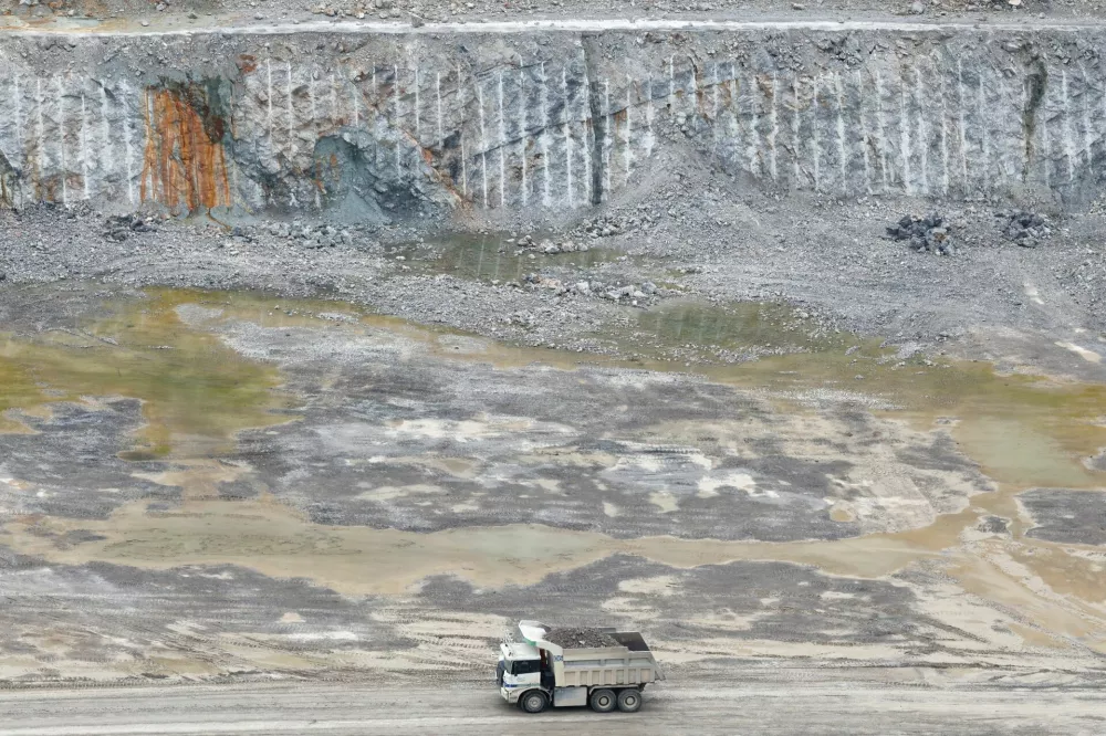 CiDi's electric autonomous mining truck operates at the TCC Cement limestone quarry in Jurong, Jiangsu province, China, July 24, 2026. REUTERS/Go Nakamura