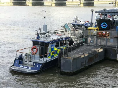 A Metropolitan police boat is seen moored near the scene of an incident involving a boat crashing into the bridge in central London on July 24, 2026, injuring a number of officers from the Met's Marine Policing Unit. Five London police officers were injured Friday after their boat patrolling the River Thames struck Westminster Bridge and they went into the water, the UK capital's Metropolitan Police Service said.,Image: 1118307672, License: Rights-managed, Restrictions:, Model Release: no 