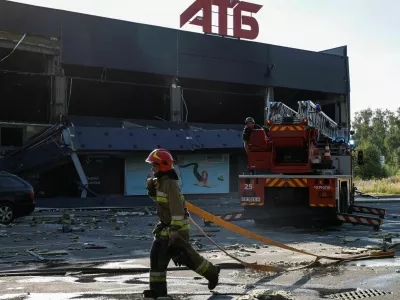 Firefighters work at the site of a supermarket hit by a Russian drone strike, amid Russia's attack on Ukraine, in Chernihiv, Ukraine July 26, 2026. REUTERS/Maksym Kishka