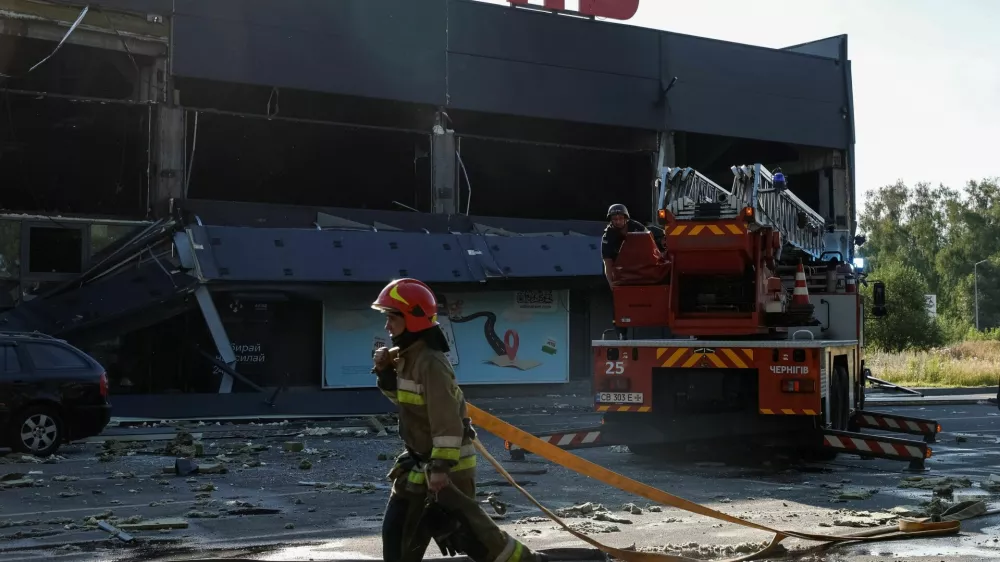 Firefighters work at the site of a supermarket hit by a Russian drone strike, amid Russia's attack on Ukraine, in Chernihiv, Ukraine July 26, 2026. REUTERS/Maksym Kishka