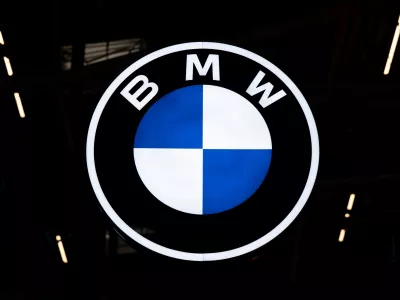 FILED - 10 September 2025, Bavaria, Munich: The BMW logo at the BMW booth during the International Motor Show (IAA Mobility). BMW is recalling hundreds of thousands of vehicles worldwide over a technical fault that could cause the cars to catch fire, the luxury carmaker said on Wednesday. Photo: Sven Hoppe/dpa