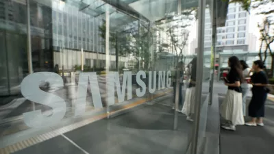 The logo of the Samsung Electronics Co. is seen at its office in Seoul, South Korea, Thursday, July 30, 2026. (AP Photo/Ahn Young-joon)