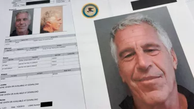 FILE - Documents that were included in the U.S. Department of Justice release of the Jeffrey Epstein files are photographed on Jan. 2, 2026. (AP Photo/Jon Elswick, File)