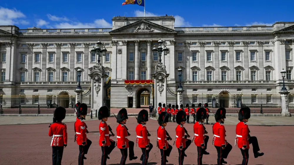 FILE PHOTO: Members of the Household Division march in front of the Buckingham Palace during the Trooping the Colour parade to honour Britain's King Charles, as part of the official birthday celebrations, in London, Britain, June 13, 2026. REUTERS/Chris J. Ratcliffe/File Photo